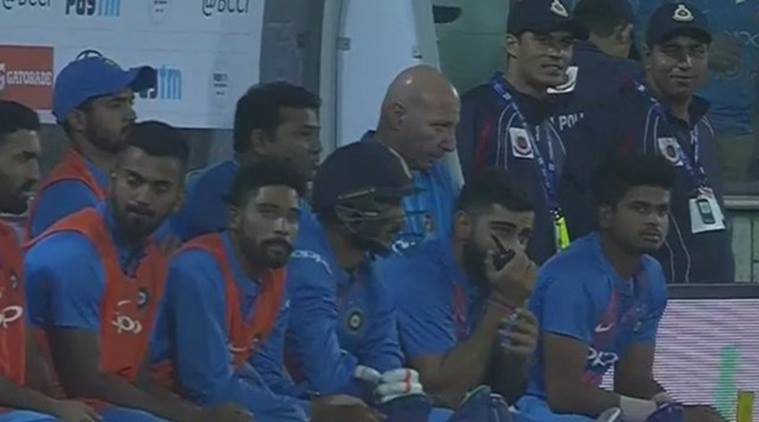 virat kohli using walkie talkie