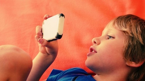 Child Looks At Mobile Phone Satya Day