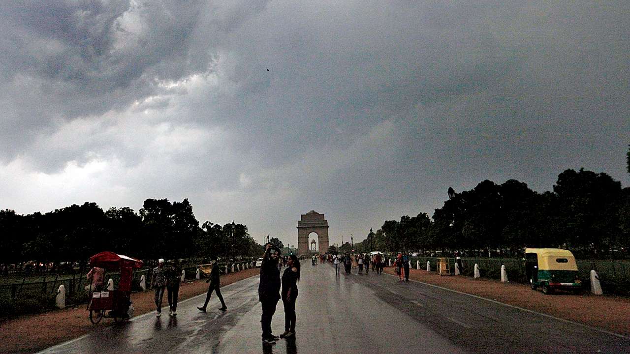 690472 dark clouds over delhi