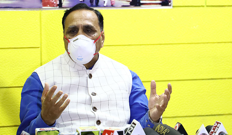 Cm Vijay Rupani With Mask Satya Day