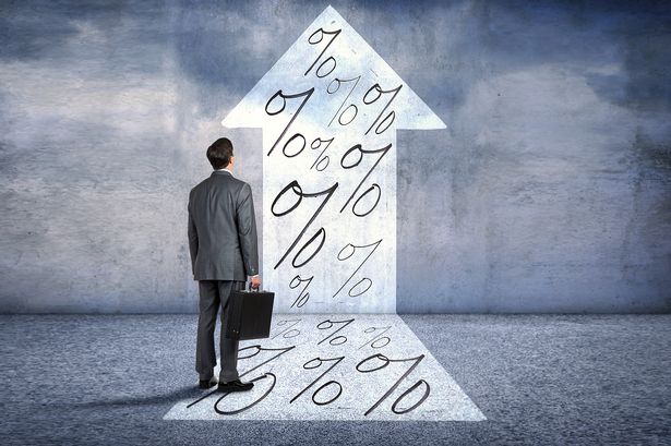 Businessman Looking At Prospect Of Higher Interest Rates