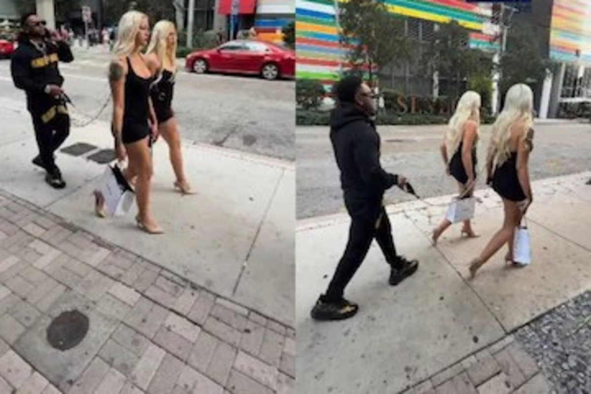 Man Walks With Girls On Leash