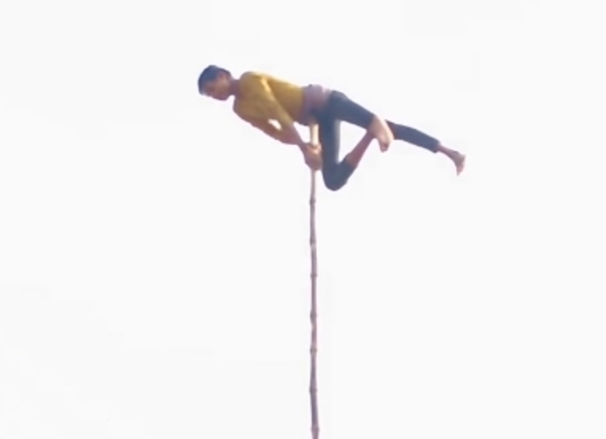 Risky Stunt On Electric Pole