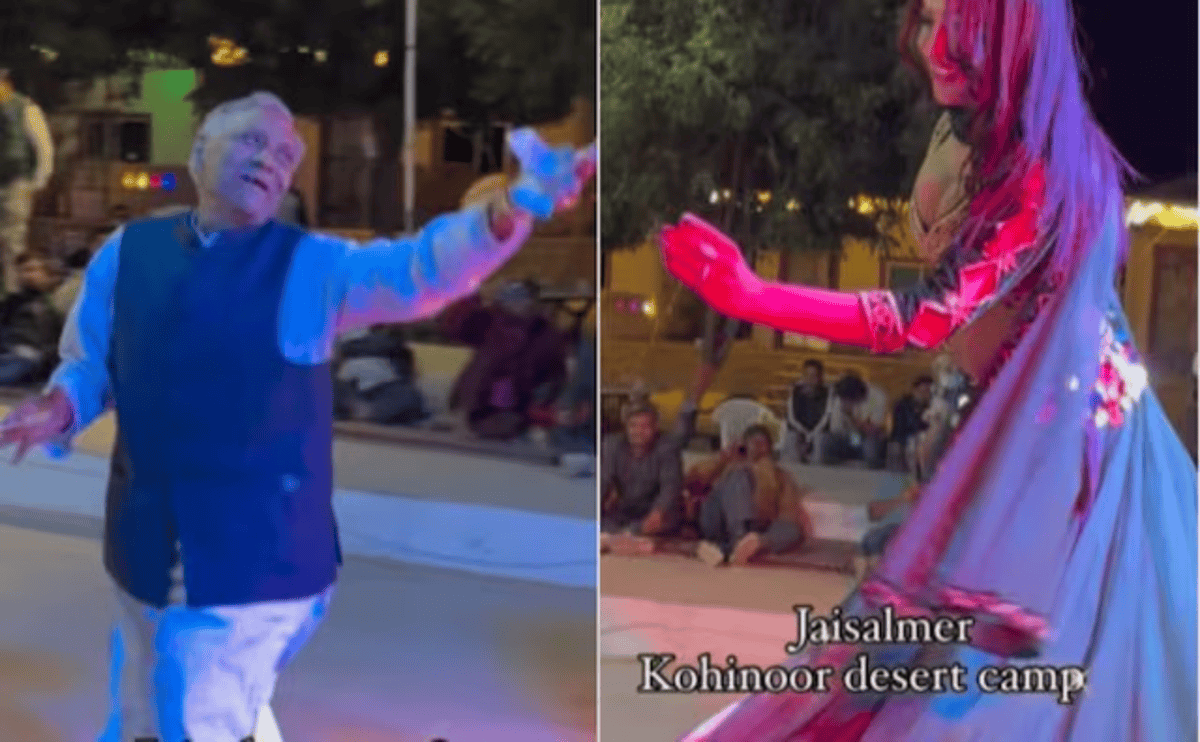 Elderly Man Dances With Female Dancer