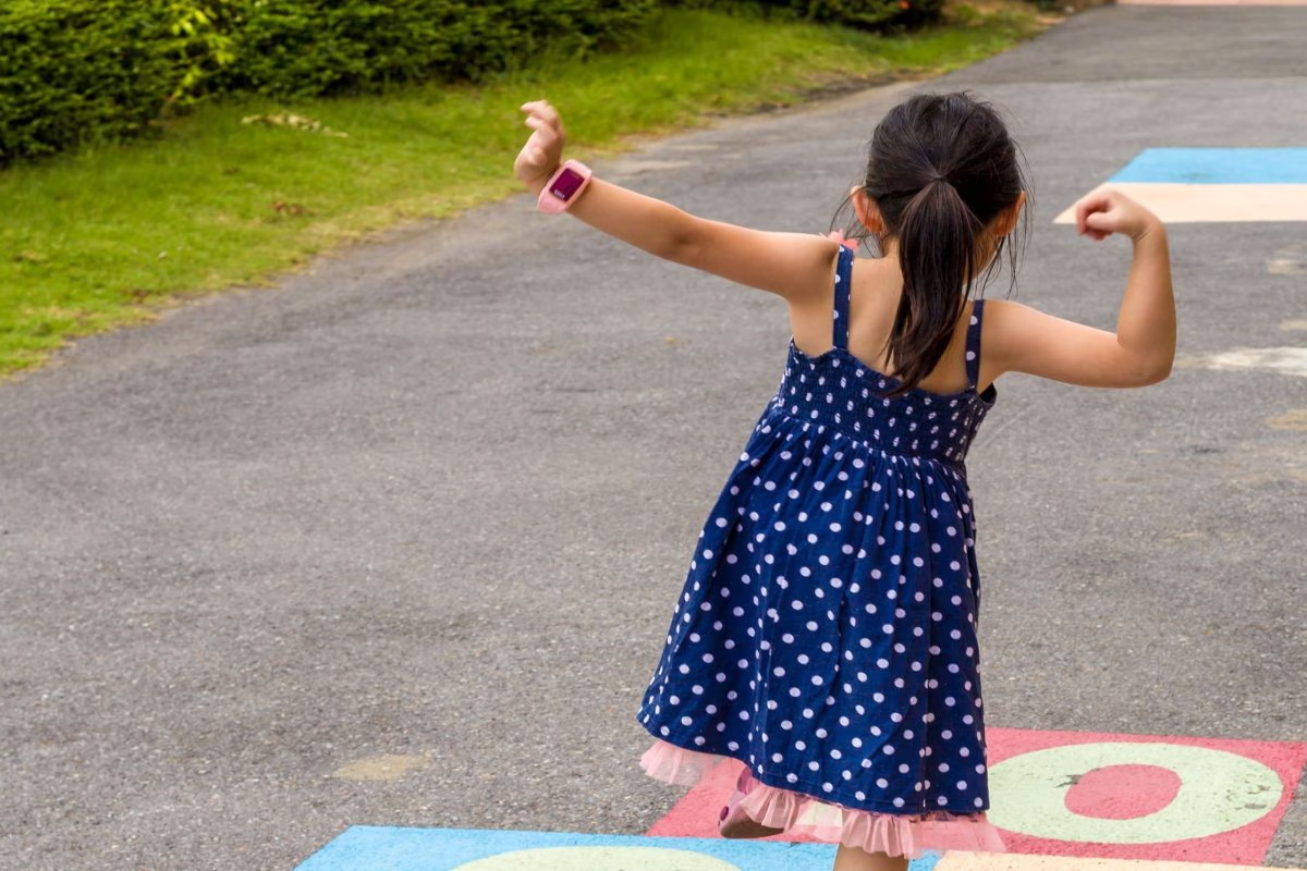 Girl Playing With Invisible Friend