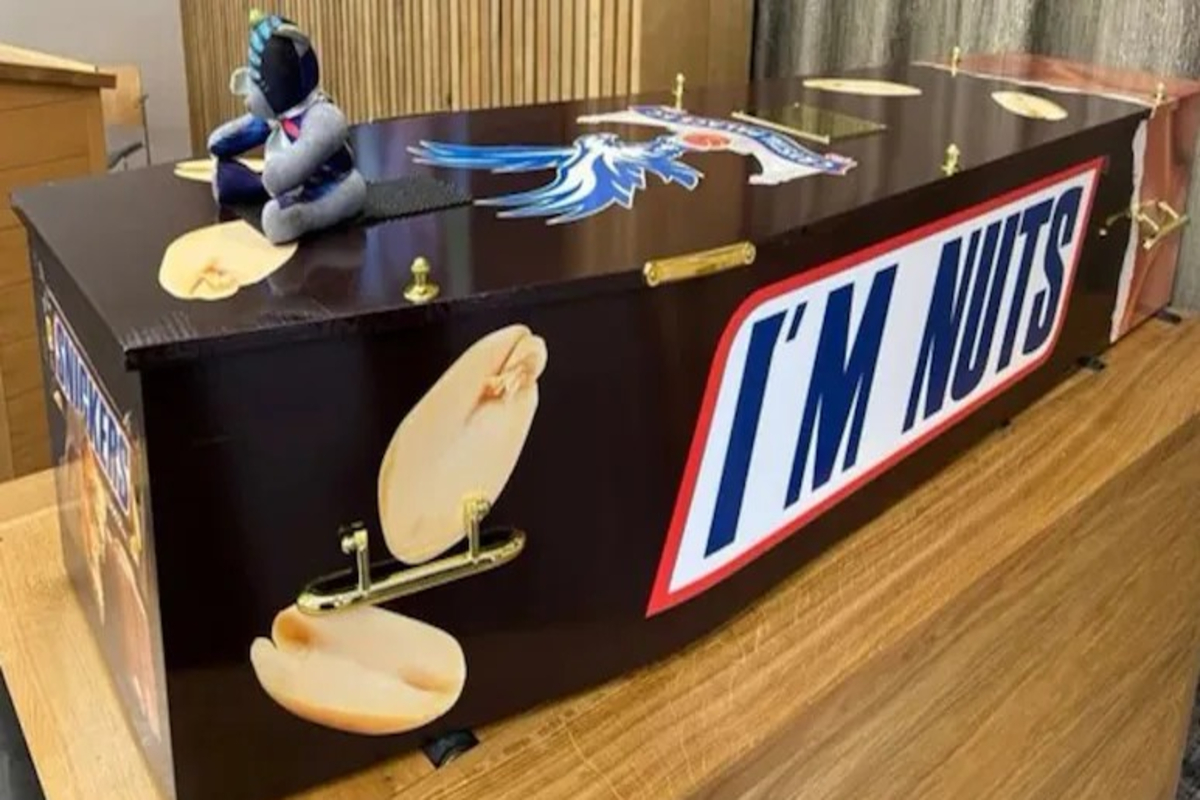 Man Buried In Snickers Themed Coffin