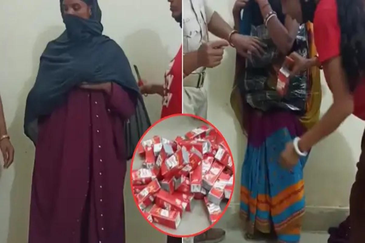 Woman Smuggles Liquor Under Burqa