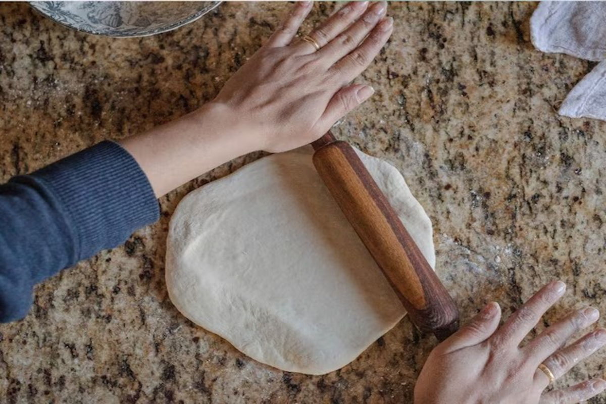 Woman Sticks Roti With Glue Video