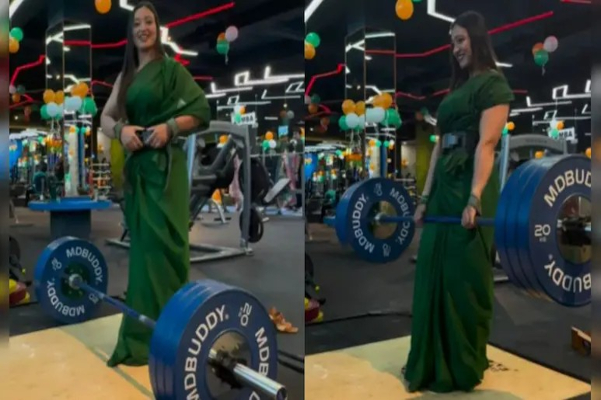 Woman weight lifting in saree video