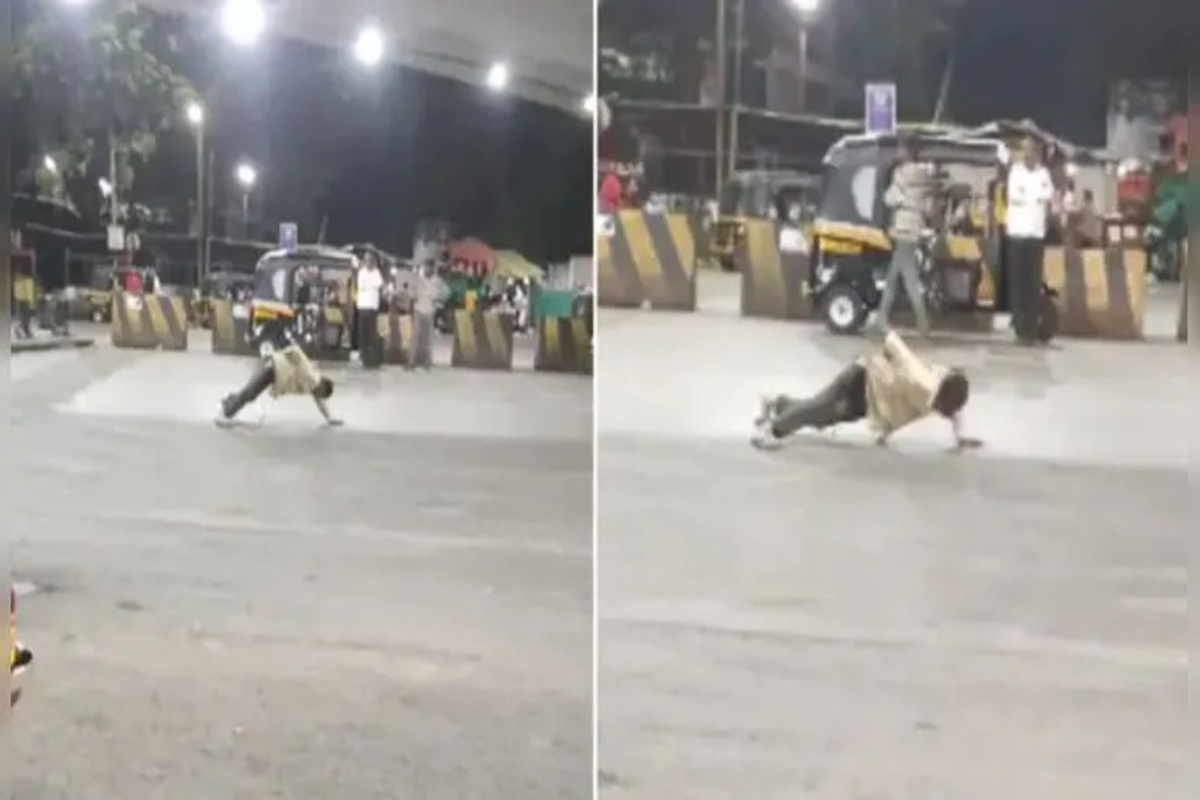 Drunk Man doing Pushups on Road Video