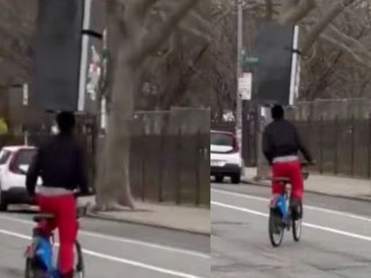 Man Balances Refrigerator