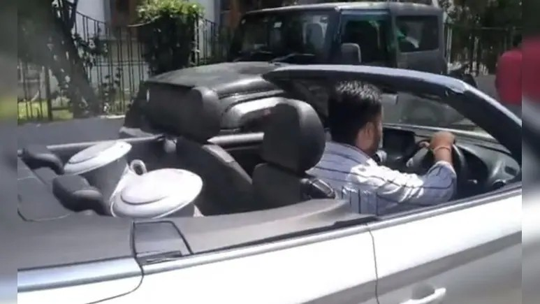 Man Deliver Milk In An Audi